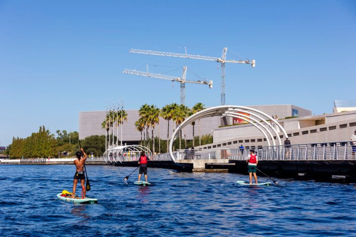 a group of people on a boat in the water